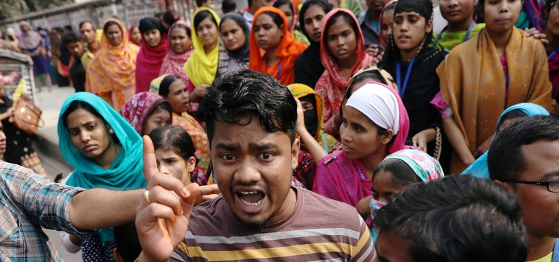 PROTESTING GARMENT WORKERS IN BANGLADESH REJECT RAISES