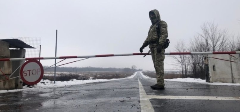 UKRAINE CLOSES CHECKPOINTS AT BORDERS WITH RUSSIA AND BELARUS