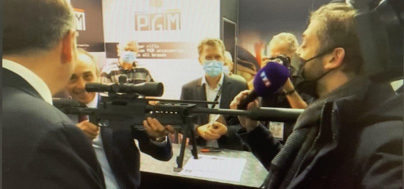 FRENCH FAR-RIGHT PRESIDENTIAL HOPEFUL ERIC ZEMMOUR POINTS GUN AT JOURNALISTS DURING PARIS FAIR