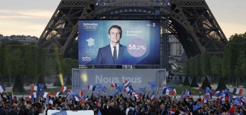 MACRON DEFEATS FAR-RIGHT LE PEN IN FRENCH ELECTION: PROJECTIONS