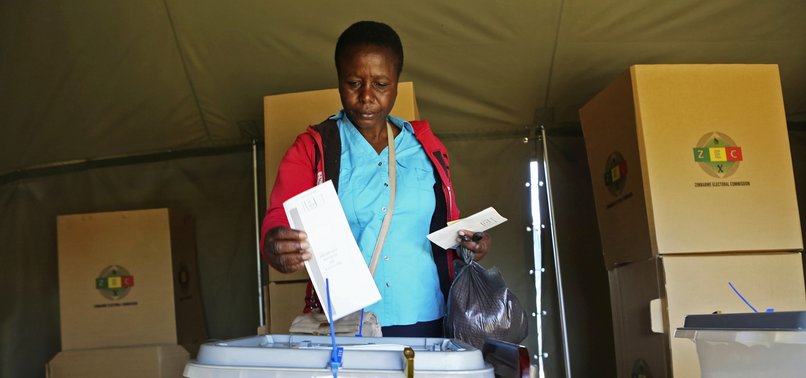 POLLS OPEN IN ZIMBABWES FIRST ELECTION WITHOUT MUGABE ON BALLOT