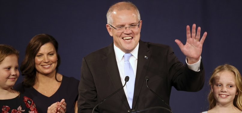 AUSTRALIAS RULING COALITION ELECTED TO SURPRISE THIRD TERM