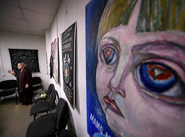 Russian police seize protest artist's work in exhibition raid