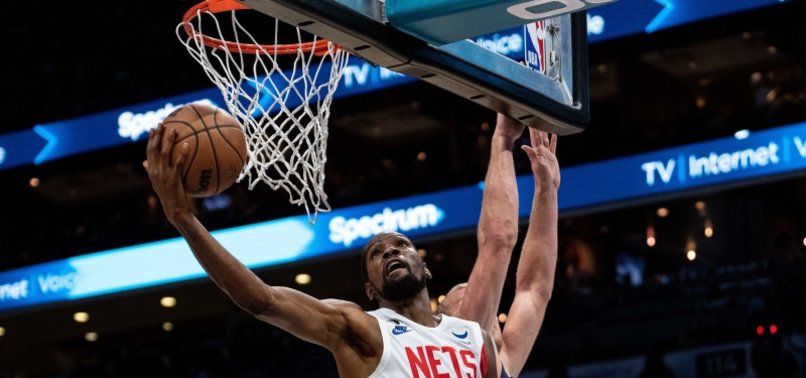 NETS FIGHT BACK BEHIND KEVIN DURANT TO TOP HORNETS