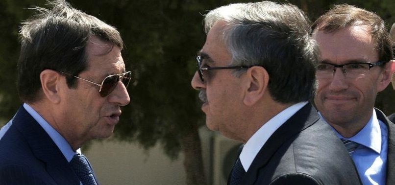 CYPRUS TALKS BACK ON TRACK AFTER TWO-MONTH BREAK