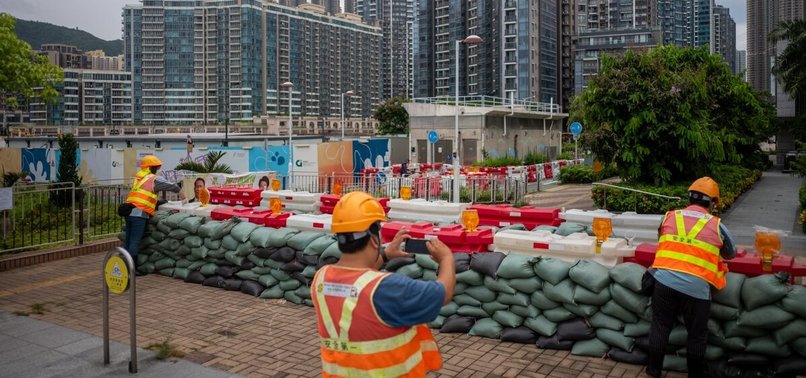 HONG KONG SHUTS DOWN CITY AS SUPER TYPHOON SAOLA APPROACHES