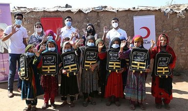 Turkish Red Crescent hands out school supplies to Afghan refugee children in Islamabad