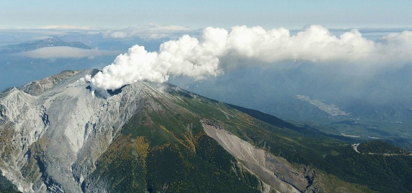 JAPANESE VOLCANO ERUPTS, SPITTING OUT SMOKE AND ROCK