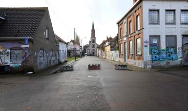 Belgium 'ghost town' fights to return to life
