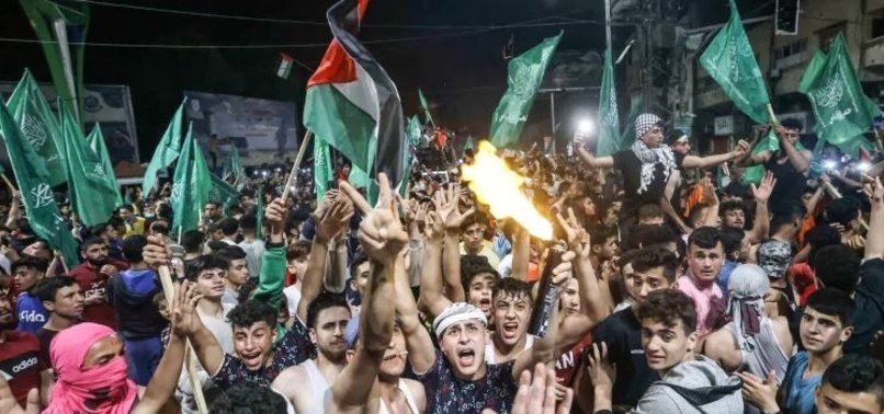 PALESTINIANS CELEBRATE AS HAMAS ACCEPTS PROPOSED CEASE-FIRE FOR GAZA STRIP