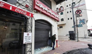 Israel forces raid Palestinian currency exchanges in occupied West Bank, seizing millions of dollars