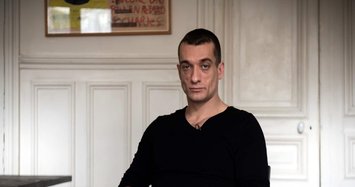 Russian artist, partner held over sex tape that felled Macron's favoured candidate for Paris mayor