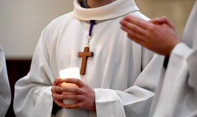 French priest charged with sexual abuse of multiple minor scouts