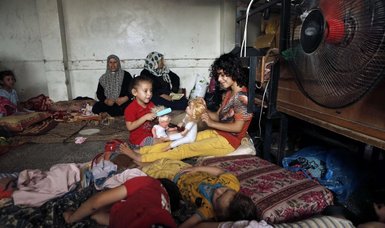 Israeli army raids shelters in northern Gaza, kicks displaced Palestinians out