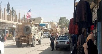 US troops conduct ground patrol in Syria's Tal Abyad