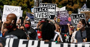 Thousand of anti-racism protesters rally in Washington to demand an end to racial inequality in U.S.