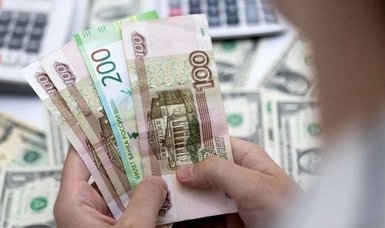 Russian rouble hovers near 90 vs dollar