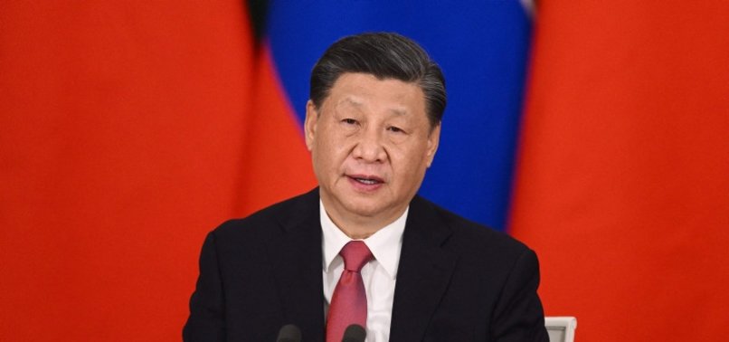 XI, AFTER TALKS WITH PUTIN, SAYS CHINA IS IMPARTIAL IN UKRAINE CONFLICT