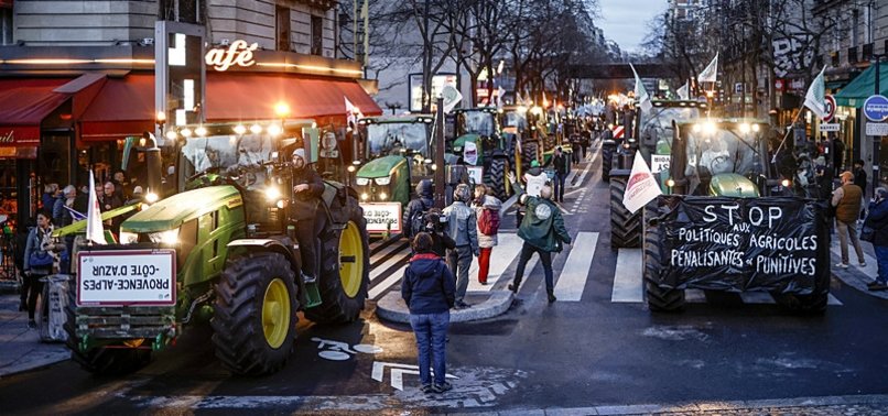FRENCH FARMERS PREPARE TOUGH WELCOME FOR MACRON AT FARM SHOW
