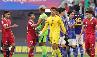 Japan beat Indonesia to seal Asian Cup last-16 spot