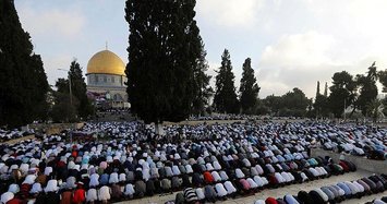 100,000 Muslims perform Eid prayers at J'lem's Al-Aqsa
