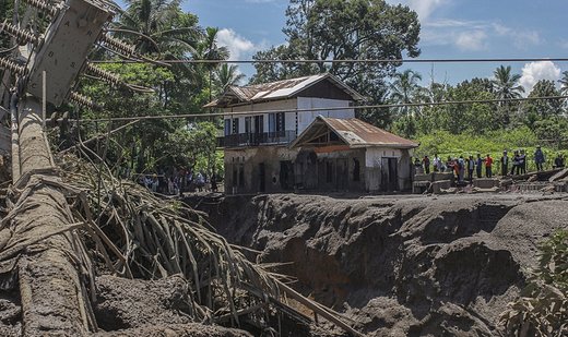 Death toll from cold lava and floods climbs to 67 in Indonesia