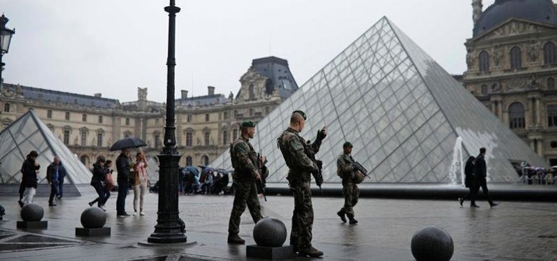 EXTRA SECURITY ALERT NEAR PARIS LOUVRE MUSEUM, AREA EVACUATED