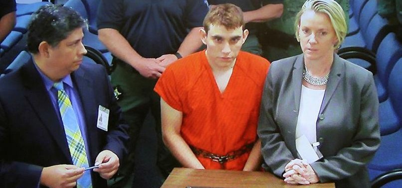 WHITE SUPREMACIST SAYS FLORIDA SHOOTER WAS GROUP MEMBER