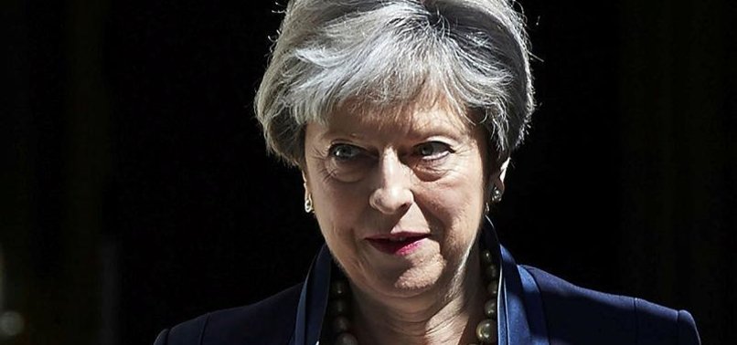 BRITISH PM DEFENDS AUSTERITY AMID CABINET SPLITS