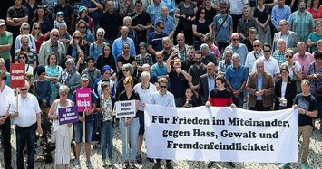 Hundreds gather in German city to commemorate slain politician