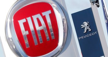 Fiat Chrysler, Peugeot sign merger deal to create new auto giant