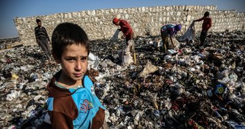 War-weary Syrian children earn their living by working in garbage dumps