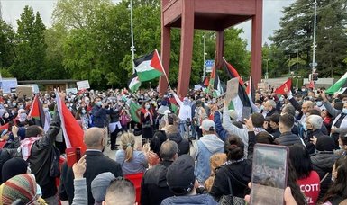 Pro-Palestine protesters rally in front of European headquarters of United Nations to condemn Israeli aggression