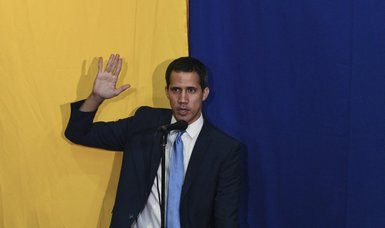 Venezuela issues arrest warrant for former opposition leader Juan Guaido