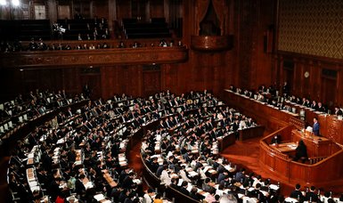 Japan's cabinet approves record 106-trillion-yen budget amid pandemic