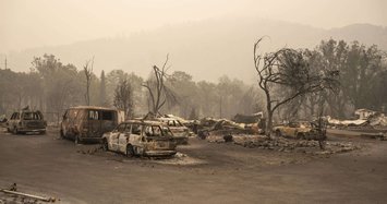 Sixteen dead in US wildfires as officials say toll could rise