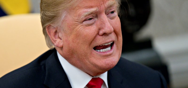 Trump bows to pressure, agrees to FBI probe of Kavanaugh