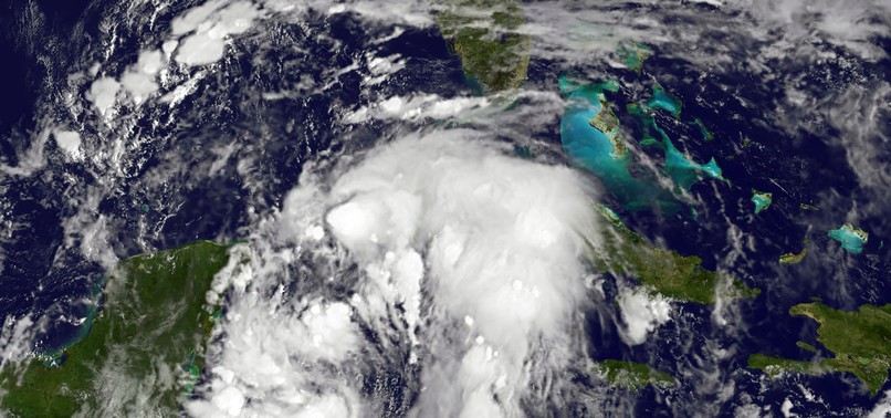 NATE BECOMES CATEGORY 1 HURRICANE, HEADS FOR POPULAR MEXICAN BEACH RESORTS