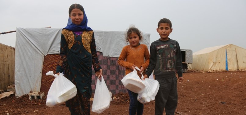 TURKISH CHARITY DISTRIBUTES FOOD AID TO SYRIAN NEEDIES IN AZAZ