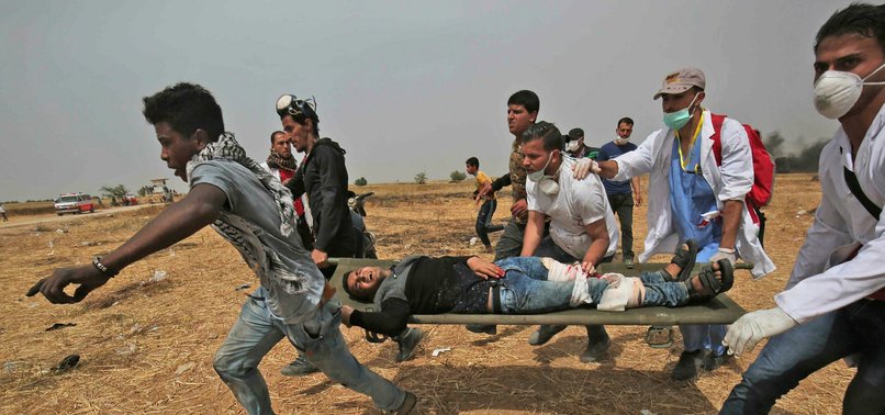 TWO PALESTINIANS KILLED BY ISRAELI FIRE NEAR GAZA BORDER
