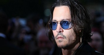 Johnny Depp 'non-violent', says ex Paradis in UK libel case