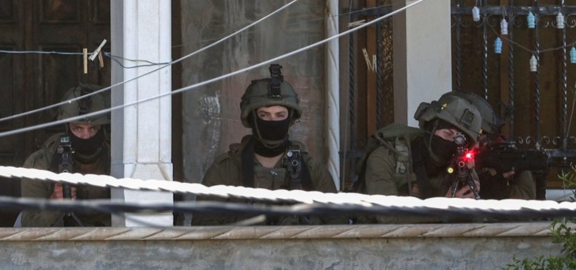 ISRAELI FORCES RAID HOMETOWN OF ELAD SUSPECTS AMID CLASHES