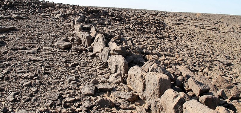 ARCHAEOLOGISTS DISCOVER ANCIENT STONE STRUCTURES IN SAUDI DESERT