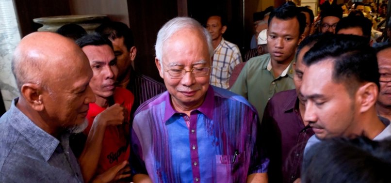 HOUNDED BY GRAFT PROBE, FORMER MALAYSIAN PM SEEKS POLICE PROTECTION