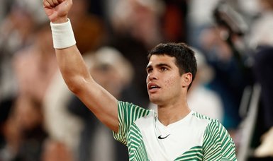 Alcaraz sets up Djokovic showdown in French Open semis