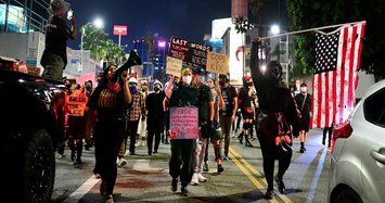 US protesters defy second night of curfew in Breonna Taylor protest