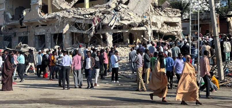 DEATH TOLL FROM SOMALIA TWIN BOMBINGS CLIMBS TO 100