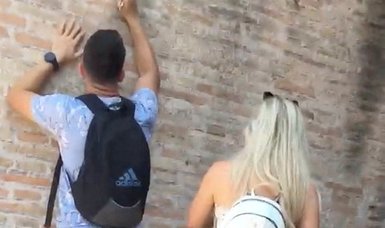 Authorities seek tourist who damaged Colosseum in Italy with a key