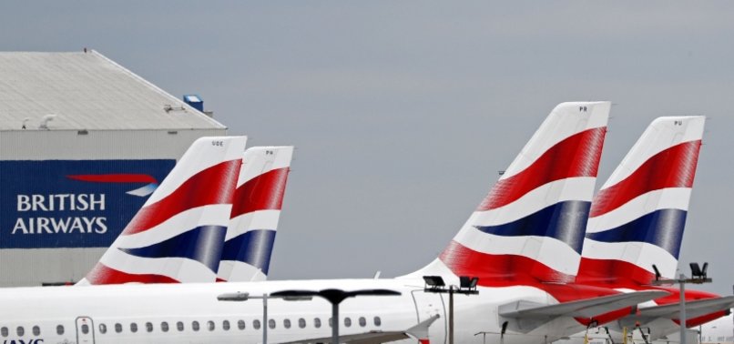 AIRLINE GIANT IAG CUTS LOSS ON COVID RECOVERY