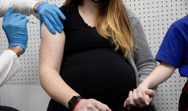 US CDC urges pregnant women to get COVID-19 vaccine
